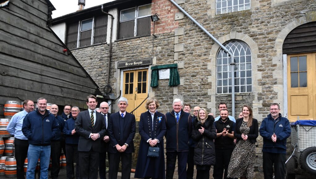 Arkells Brewery Directors and staff with plaque